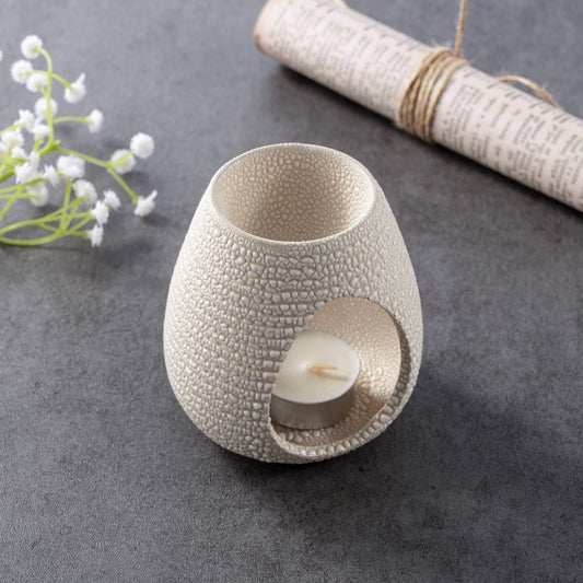 handmade ceramic wax burner shaped like a beehive